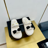 DAD SANDALS WITH BOW IN WHITE LAMBSKIN MULE